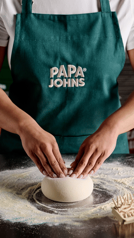 Hands kneading a dough stress ball