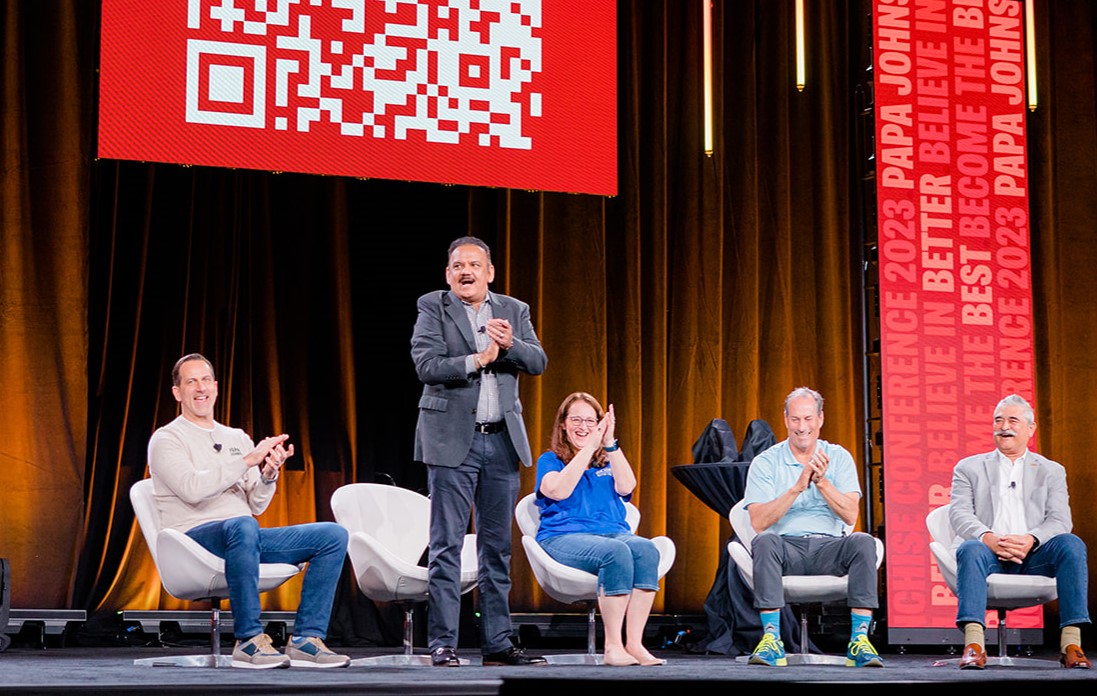 Nadeem Bajwa speaks at the 2023 Papa Johns Franchisee Conference